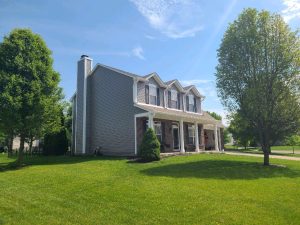 Side elevation of completed exterior home painting.